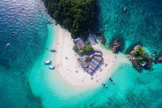 All-in Phi Phi, Maiton, MayaBay, Khai, Bamboo islands Tour - Hotel pickup and the race to the private pier
