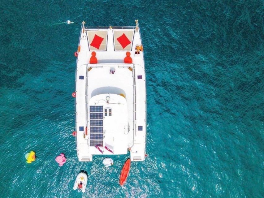 Amazing Coral Island & Sunset Dinner with Power Catamaran - Coral Island: beach time first, water activities second