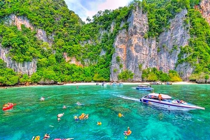 Explore Phi Phi, Maya Bay & Khai Island with Lunch from Phuket - Snorkeling and swimming around Phi Phi Don