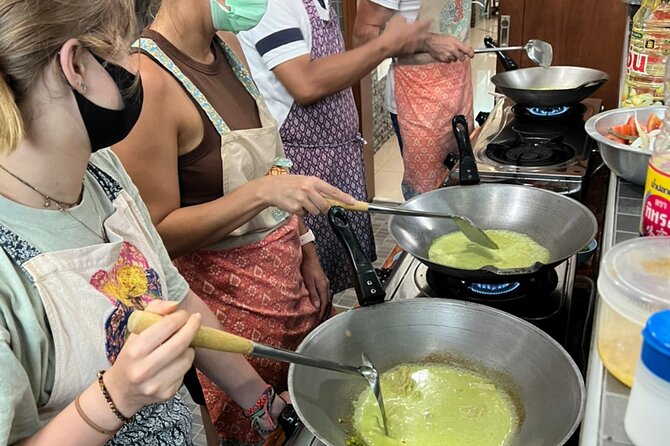 Half day Thai cooking Class + Market tour+Garden tour - Woody Kitchen in Kata: garden, preparation, and cooking
