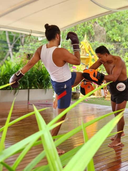 Muay Thai Boxing Class for Beginners - Pad work makes the hour feel active