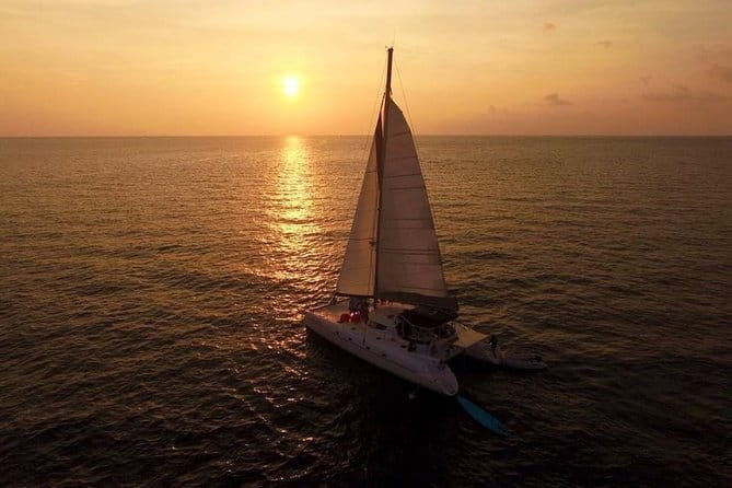 Phuket: Aeolos Catamaran Tour to Coral & Racha Islands + Lunch - The return passes Promthep Cape