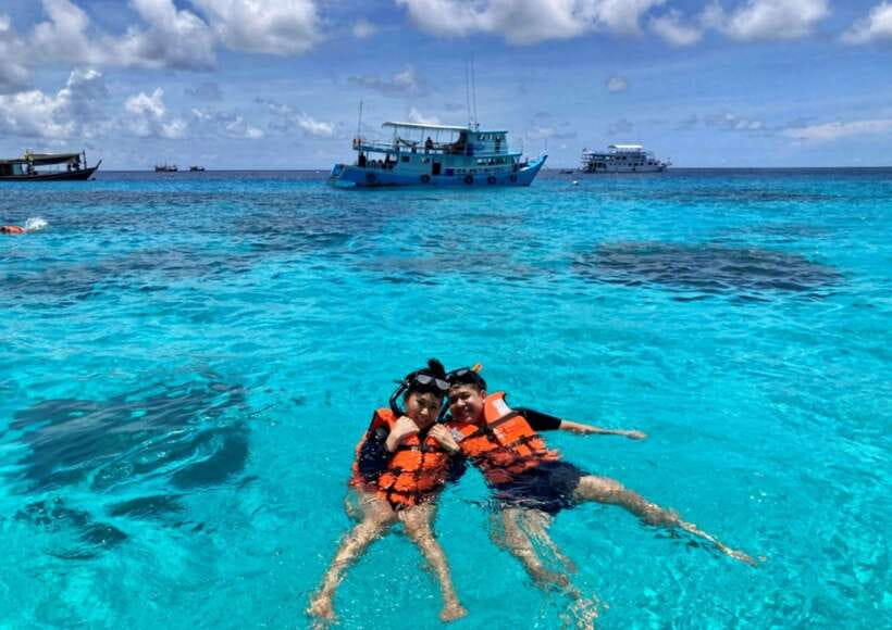 Phuket: Coral Island Catamaran Cruise with Sunset Dinner - Dinner on board near Promthep Cape