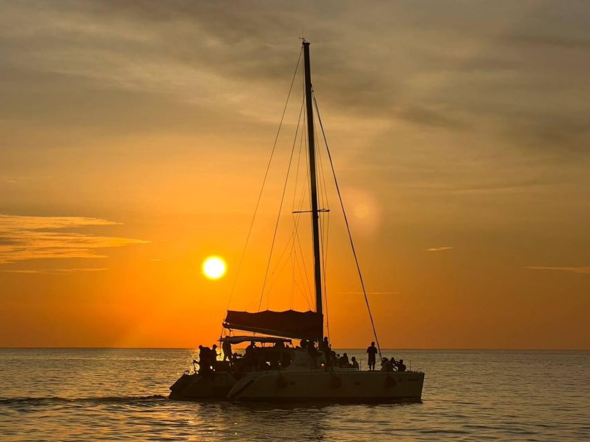 Phuket: Coral Island & Sunset Dinner by Sailing Catamaran - Cruising from Chalong on a catamaran