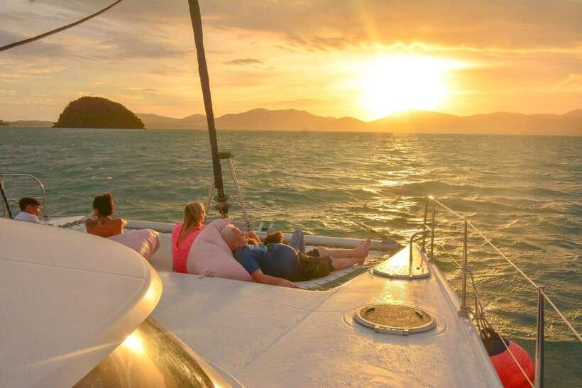 Phuket: Coral Yacht Boat Tour to Coral Island with Sunset - Pirates Beach and the first swim