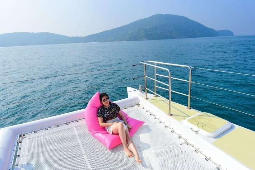 Phuket: Coral Yacht Boat Tour to Coral Island with Sunset - Snorkeling around Raya Island