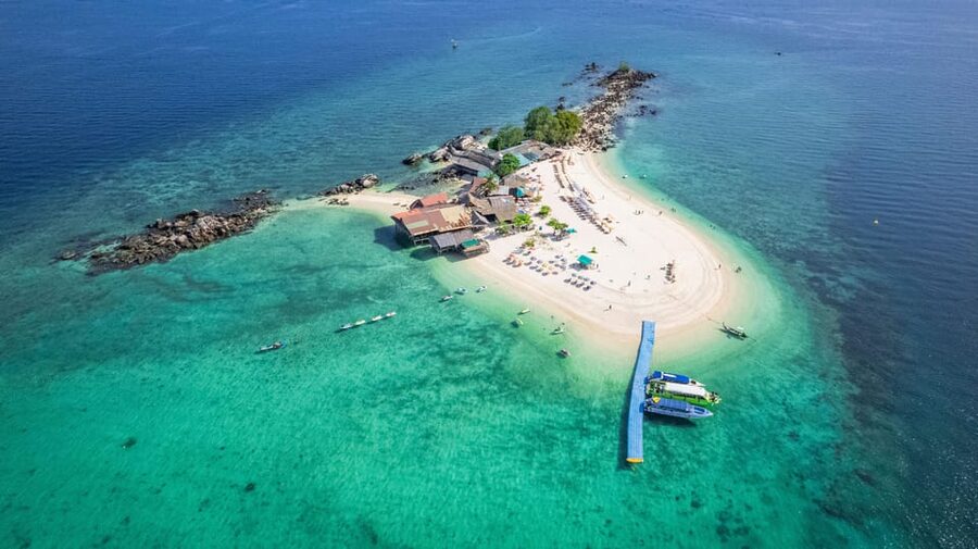 Phuket: Khai Islands Premium Speedboat Half Day Adventure - Khai Nui: scenic, rocky, and mainly for the water