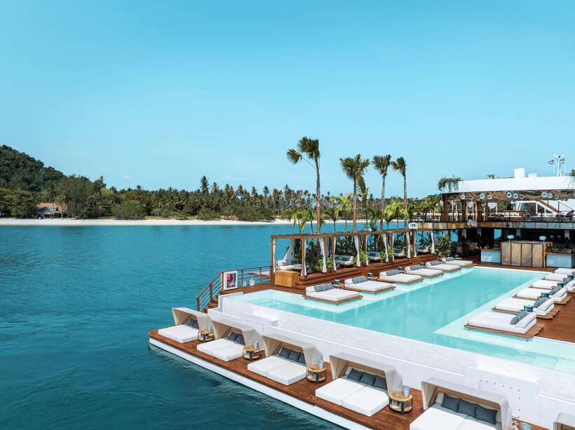 Phuket: YONA Floating Beach Club Day Experience - Arriving at the pier and taking the shuttle