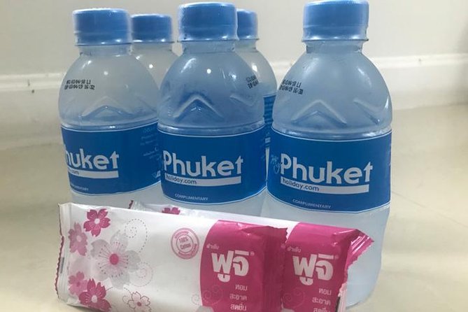 Private Airport Transfer in Phuket - Cars, vans, water, and luggage space