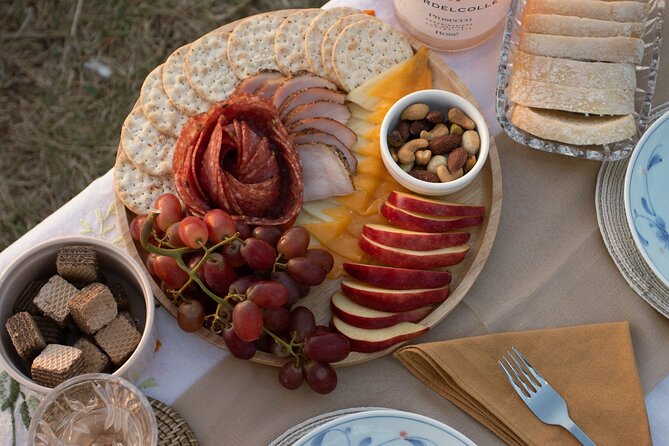 Romantic Picnic on a Phuket Beach During Sunset - Cheese, charcuterie, and a relaxed meal