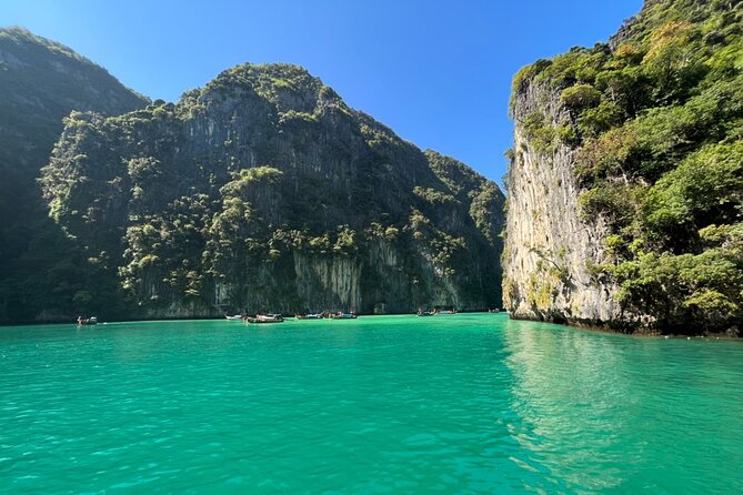 Small Groups of 20 people - Phi Phi & Bamboo Islands with Lunch - Viking Cave adds context to the scenery